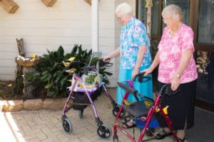 Gloria and Ellie tending the birds at Yukana