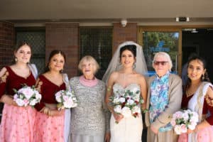 Bride with bridal party and Yukana residents